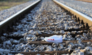 Psychological Abuse Is Physical Abuse - White Shoe With Blood On It On Railroad Track
