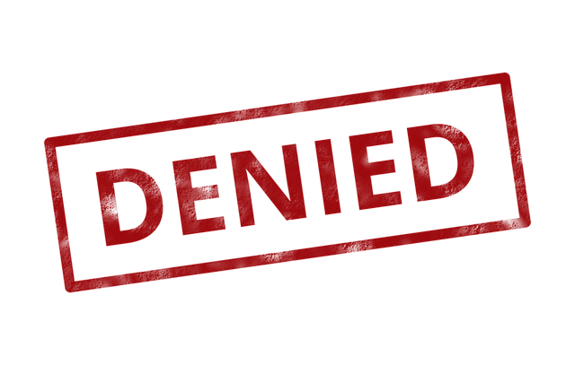 The Dangers of Denial - The Word Denied in Red 