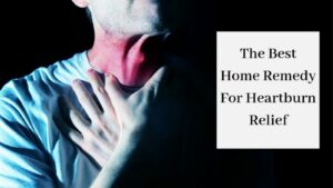 The Best Home Remedy For Heartburn Relief - Man Holding Inflamed Throat