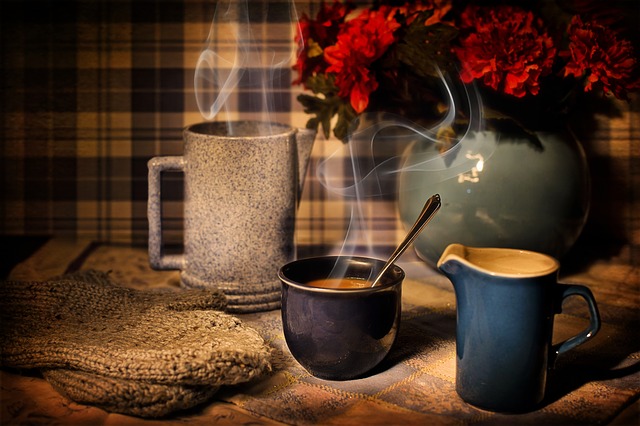 Coffee And Metabolism - Steaming Mugs Of Coffee